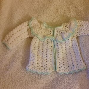 Crocheted baby jacket and pants